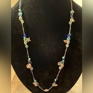 Bee, flower, butterfly and blue bead charm necklace. Double silver tone necklace